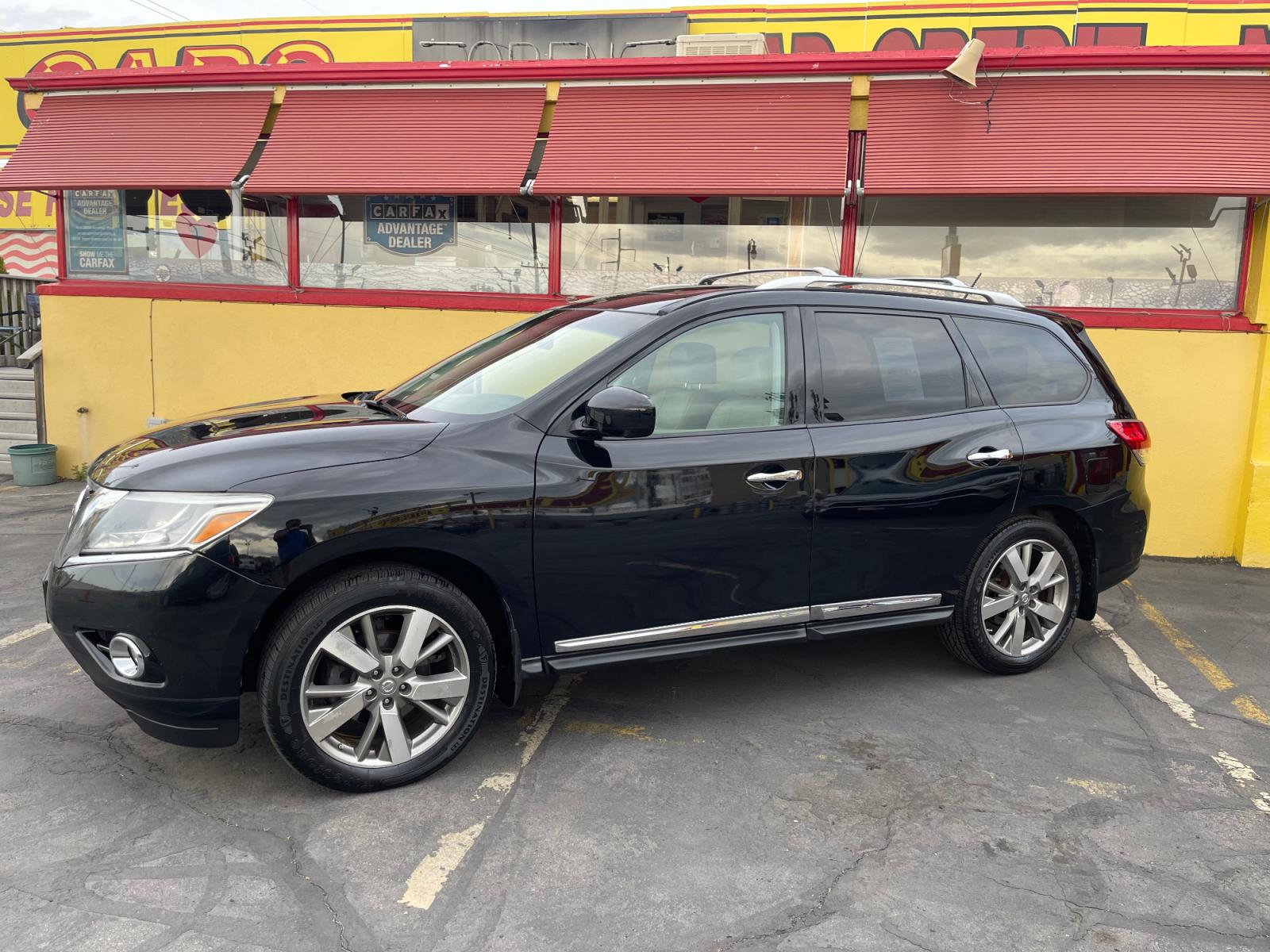 2014 Black /Tan Nissan Pathfinder Platinum (5N1AR2MM1EC) with an 3.5 Liter V6 engine, Automatic transmission, located at 801 South State Street, Salt Lake City, UT, 84111, (801) 328-0098, 40.751953, -111.888206 - Features: 20 Inch Plus Wheels, Power Hatch/Deck Lid, 4WD/AWD, Premium Package, A/C Seat(s), Rear Air Conditioning, Alloy Wheels, Rear Entertainment System, BOSE Sound System, Rear Seat Heaters, Bluetooth Technology, Rear View Camera, Fold-Away Third Row, Remote Start, Front Seat Heaters, Satellite R - Photo #1